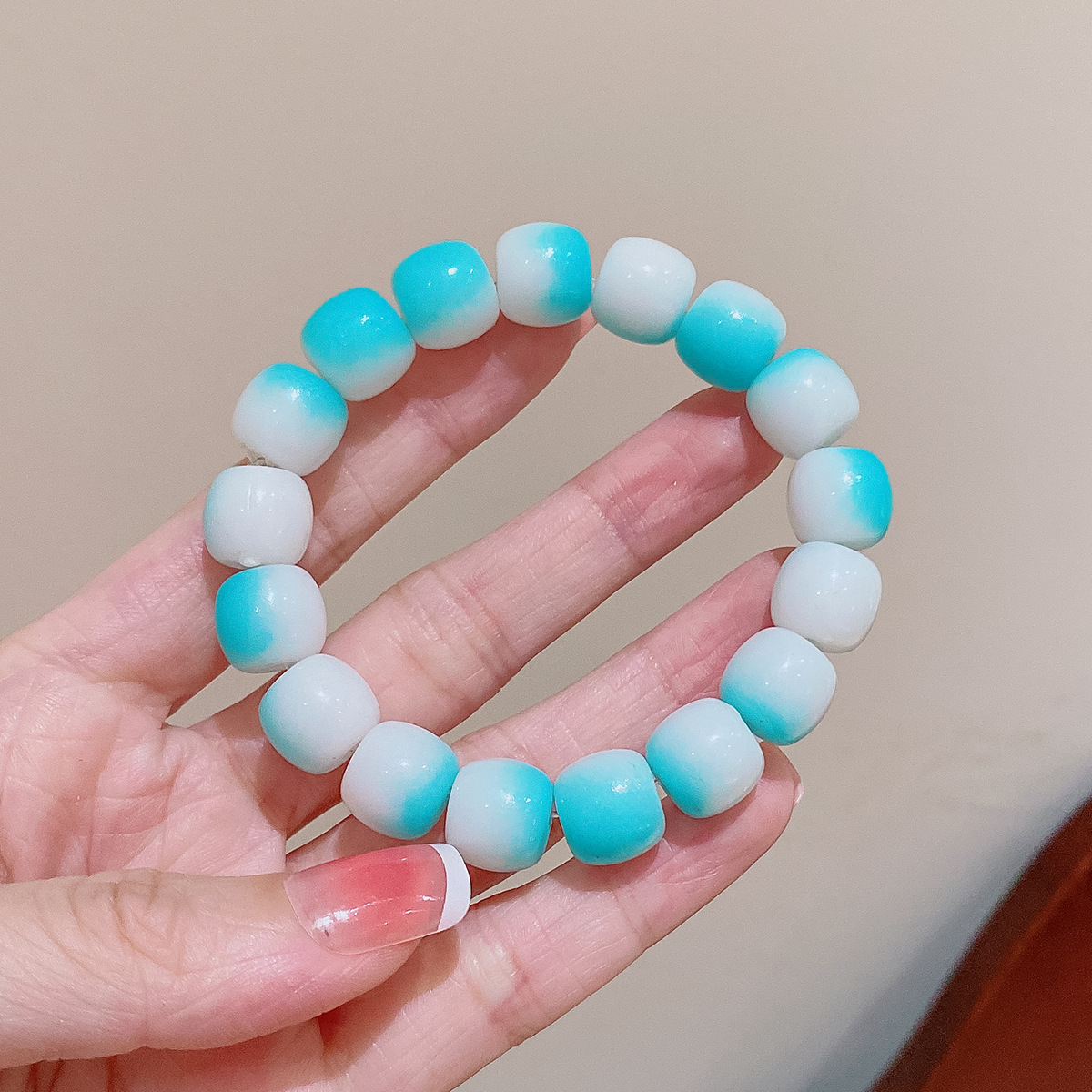 Tiktok mismo gradiente de color placa jugando pulsera estudiante partido dedo bobinado suave descompresión pulsera de cuentas Yiwu pequeña joyería al por mayor
