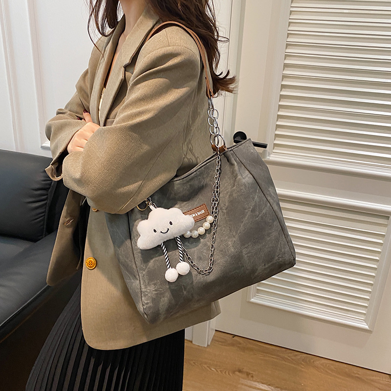 Capacidad de gran cadena de TOT 2024 nueva bolsa de moda de viaje de hombro de invierno para estudiantes universitarios superiores bolsa de clase