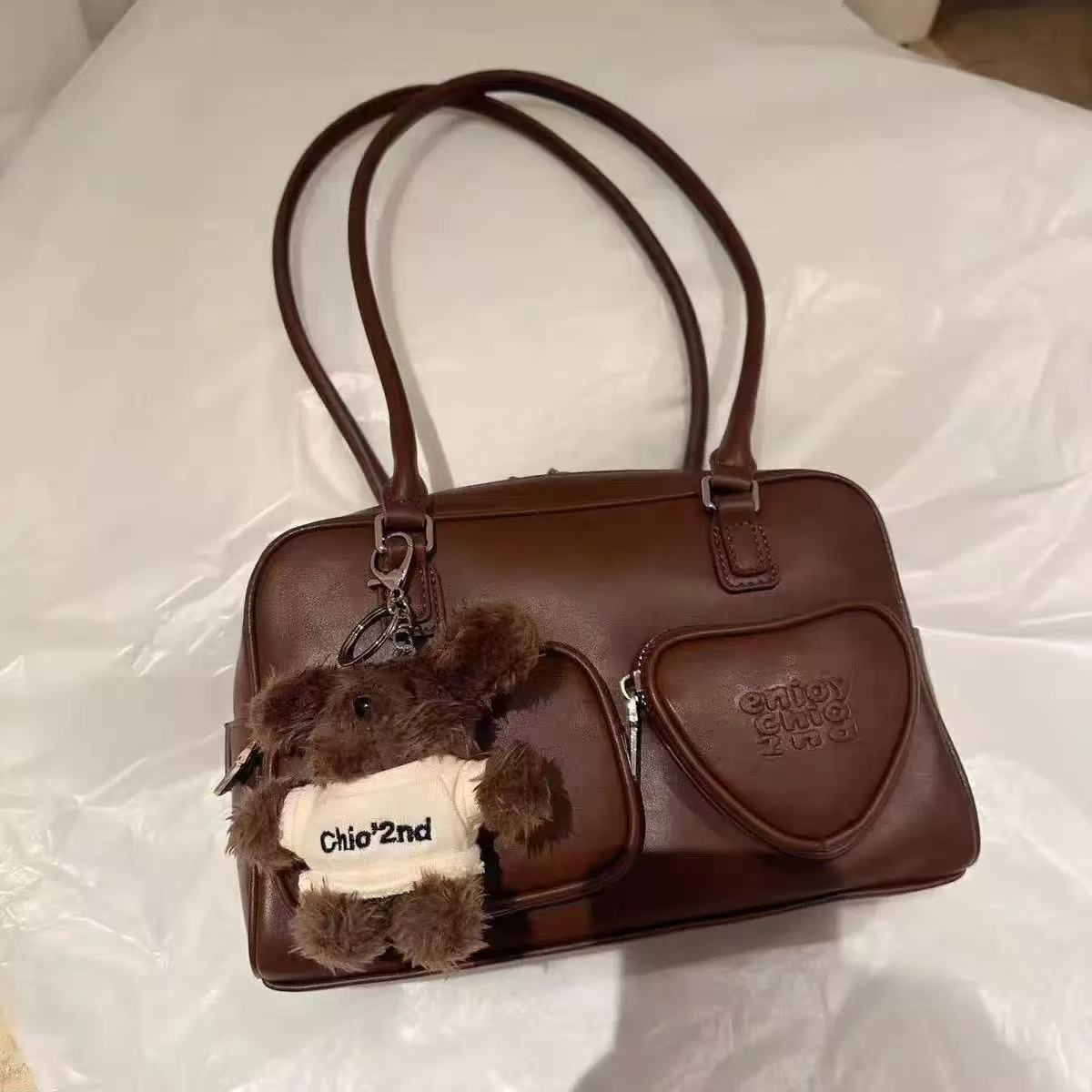 同款上新  画报少女枕头包今年流行爆款包包女士手提单肩腋下包