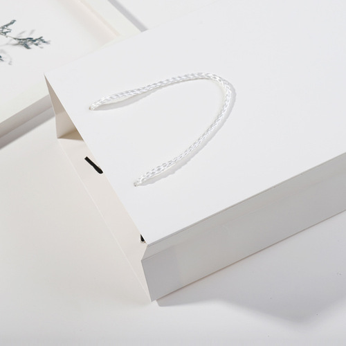 Cowhide handbag men's shoes women's clothing store gift box food gift cosmetic paper bag printing logo