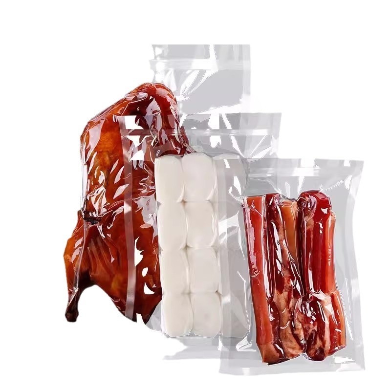 Fábrica en stock bolsa de alimentos bolsa de vacío transparente bolsa brillante sello de plástico de vacío bolsa de alimentos compuesto bolsa de vacío de impresión