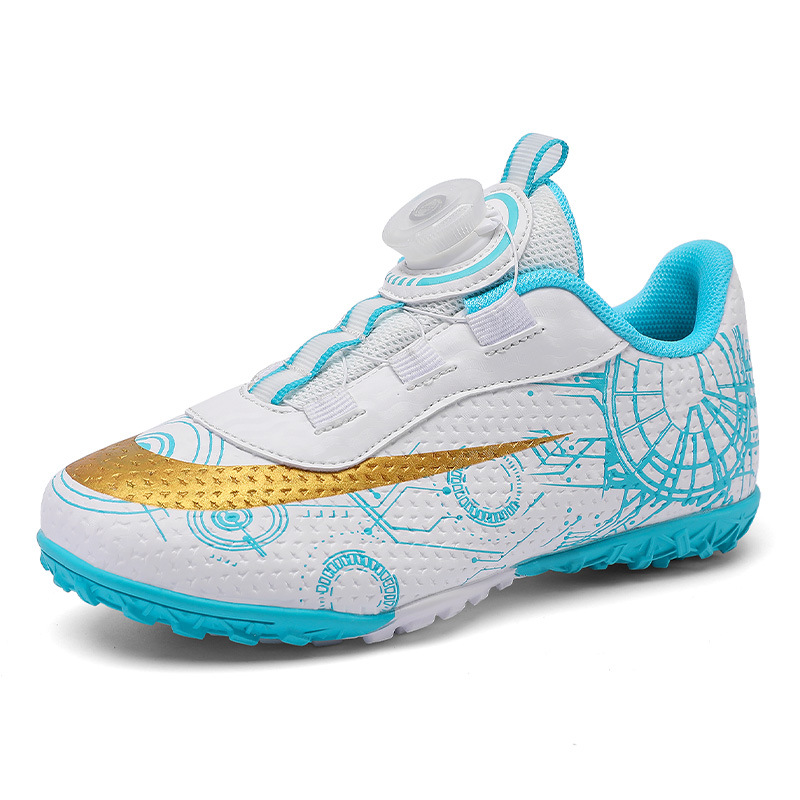 2023 hebilla giratoria transpirable para niños zapatos de fútbol de uñas rotas zapatos de entrenamiento de hierba de interior Pato Mandarín zapatillas de fútbol resistentes al desgaste