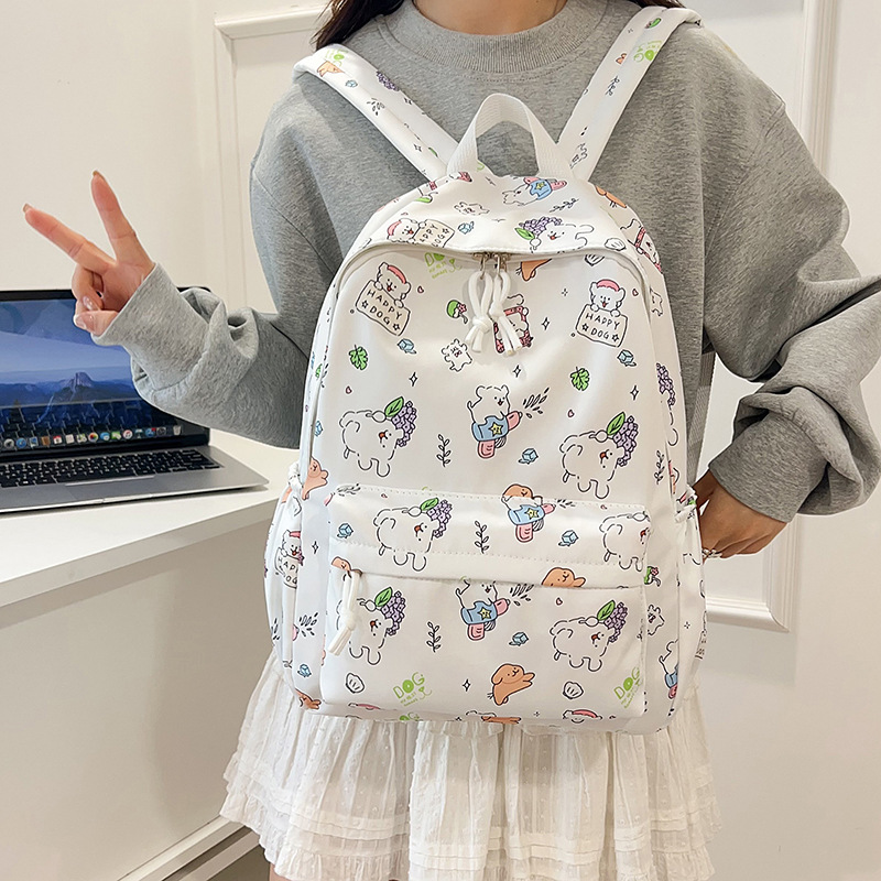 Mochila de graffiti de dibujos animados ligera, mochila de gran capacidad japonesa, mochila de estudiantes de escuela secundaria pequeña y fresca.