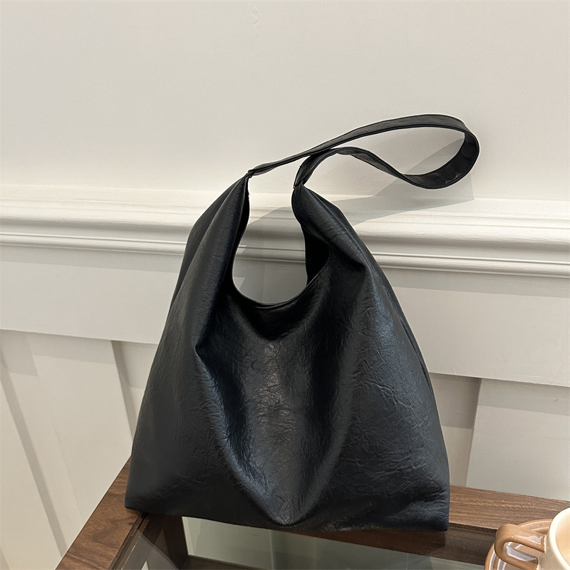 Textura de piel de aceite de gran capacidad perezosa de viento suave de color sólido retro invierno ocio viaje de la axila bolso de hombro
