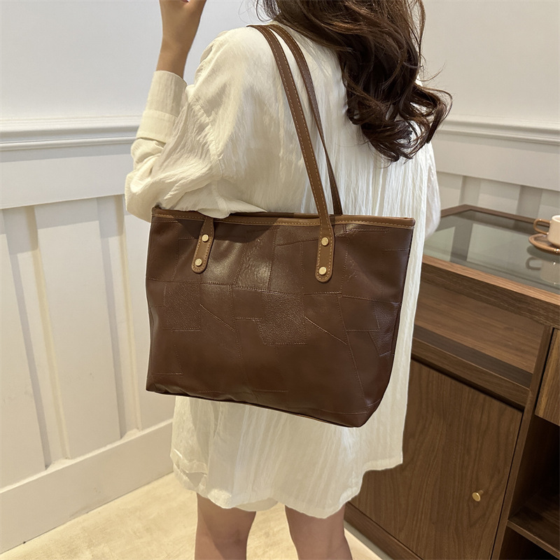 Textura de cuero suave bolso grande para mujeres 2024 nueva moda de gran capacidad bolso de hombro de alta calidad TOT bolso de mano universal