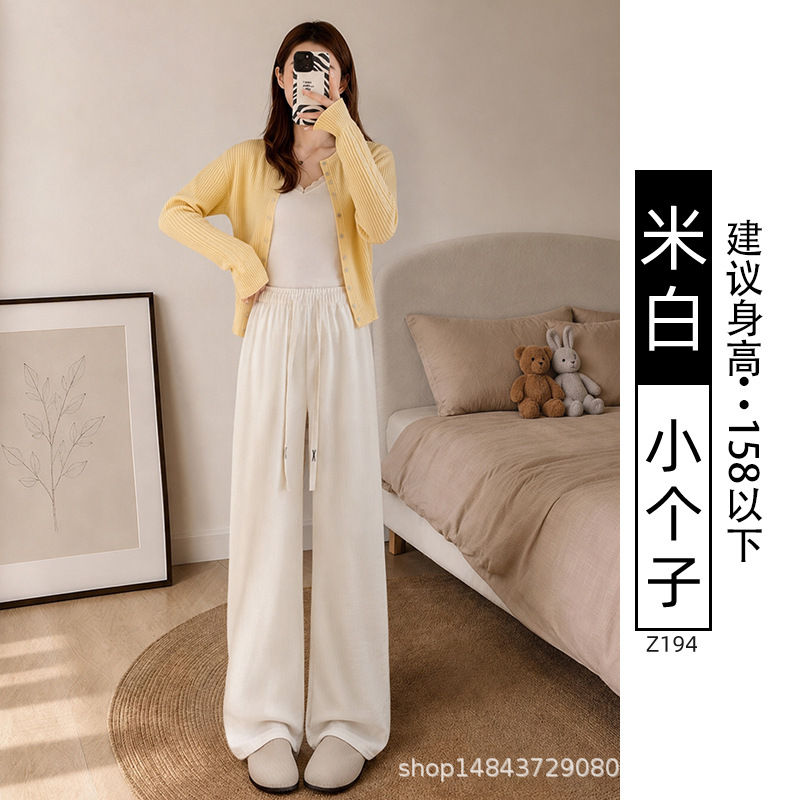 Pantalones blancos de piernas anchas de mujer primavera y otoño 2026 nuevo tipo de cintura alta suelta perezoso pequeño casual pantalones de punto recto estrechos