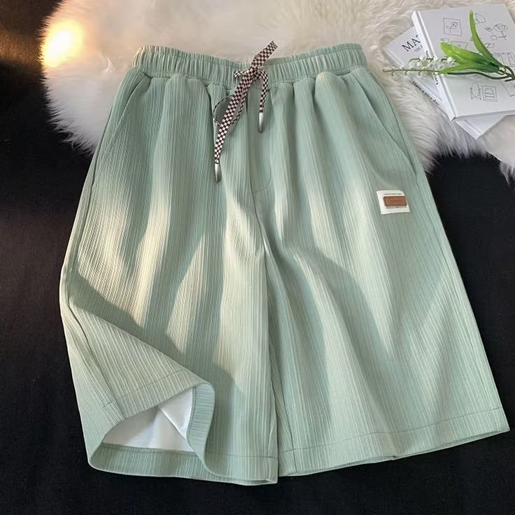 Pantalones casuales primavera y otoño Juventud Popular color sólido Pantalones deportivos moda marca quinta pantalones moda Harajuku suelta nuevos hombres