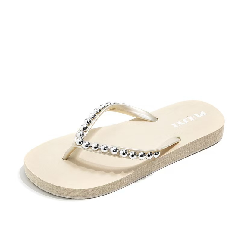 Pearl coreano plano chinchillas de verano para mujeres 2025 nuevo clip pies de playa antideslizante zapatillas de playa para mujeres
