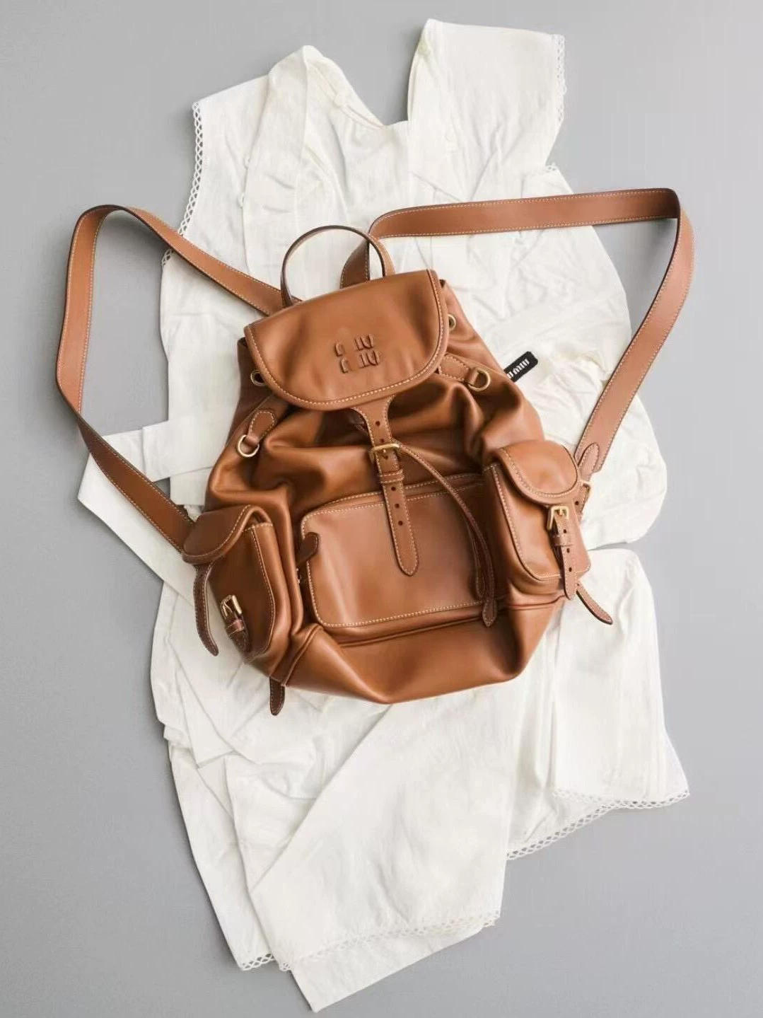 Backpack, universal retro capacious bag, genuine leather, drawstring