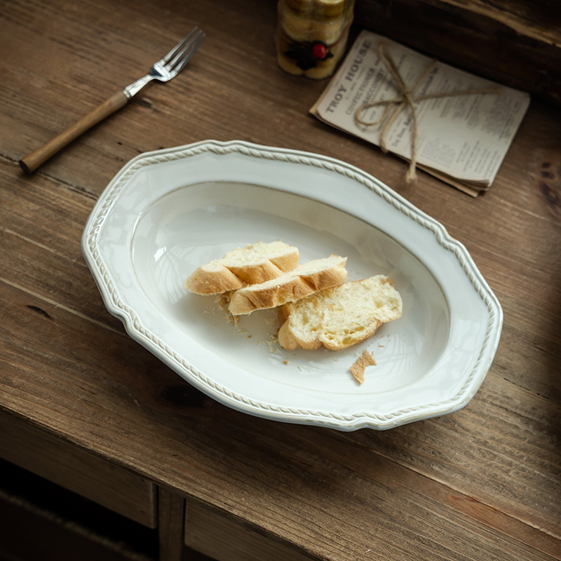 Cerámica retro francesa en relieve de alta calidad, platos de comida occidentales, platos de pescado al vapor, platos de ensalada de frutas, platos al por mayor