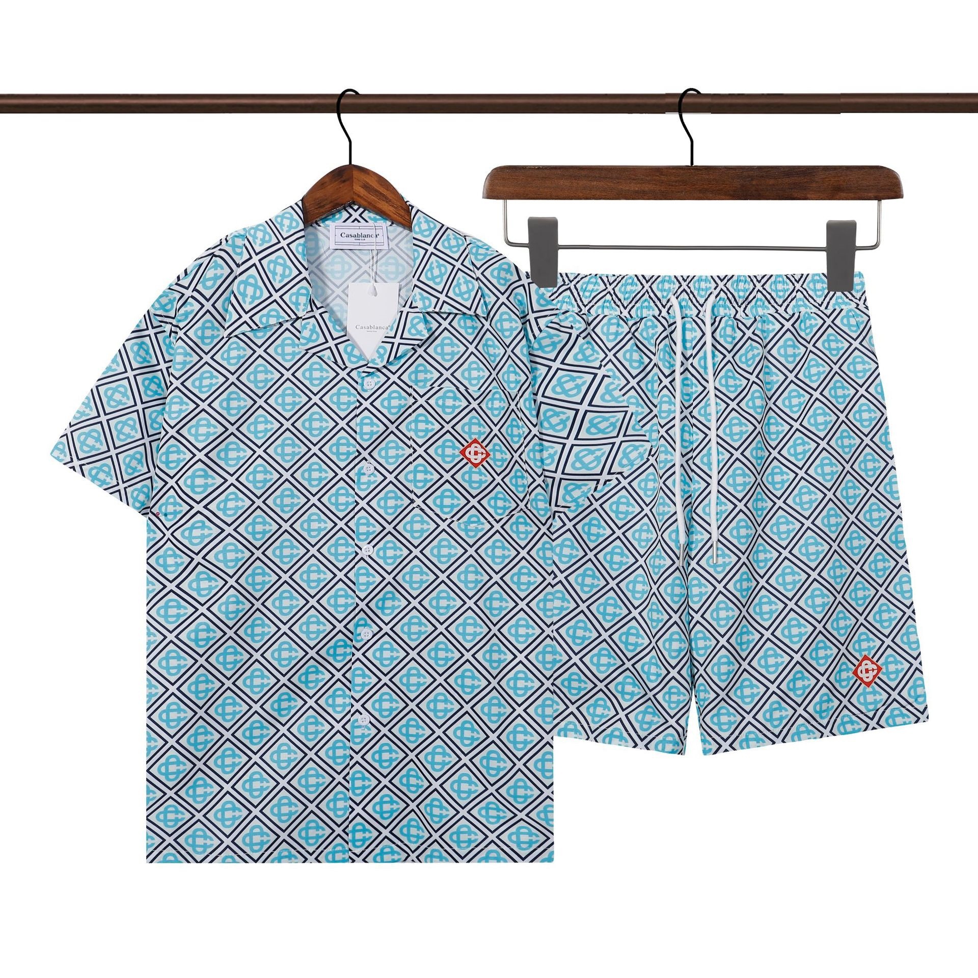 Transfronterizo de verano Amiri set clásico impresión de caju amiri camisa corta casual ropa deportiva para hombres y mujeres