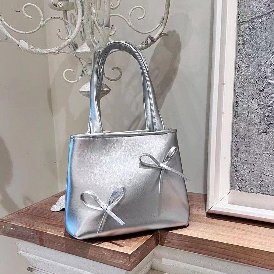 2023 nuevo y2g dulce fresco chica caliente pequeño bolso de plata mini bolso del teléfono arco bolso para las mujeres