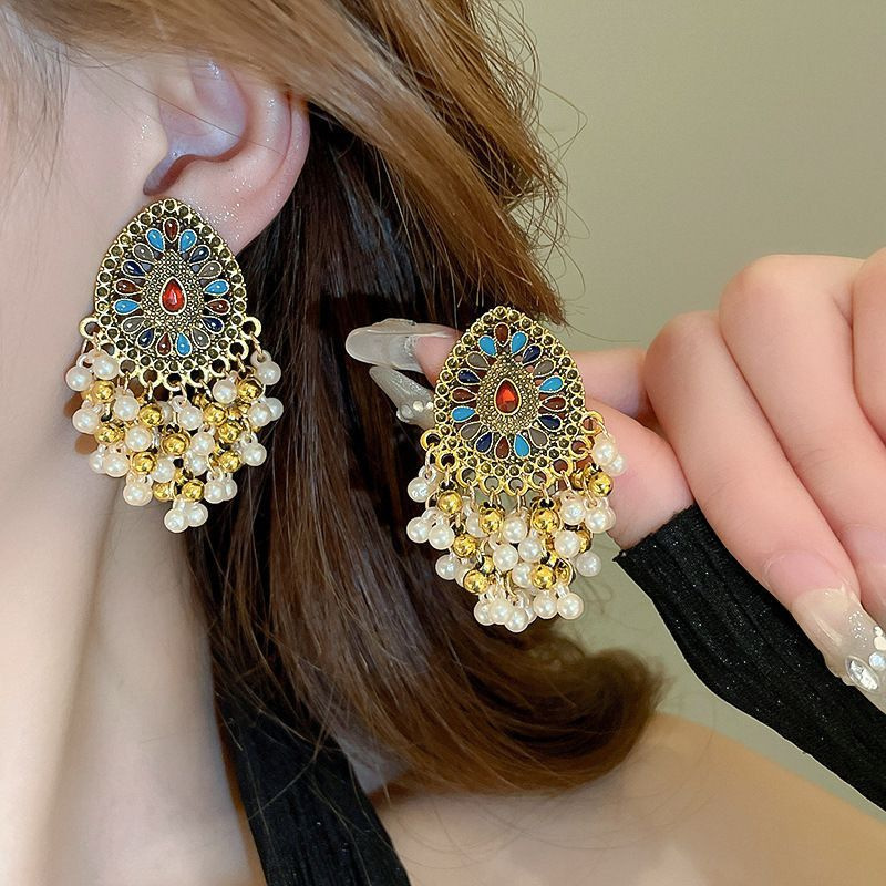 Pendientes de suministro de mercado nocturno de agujas de plata Pendientes de moda coreana en vivo Pendientes de estilo caliente Pendientes de lujo ligero Mujeres de alta gama