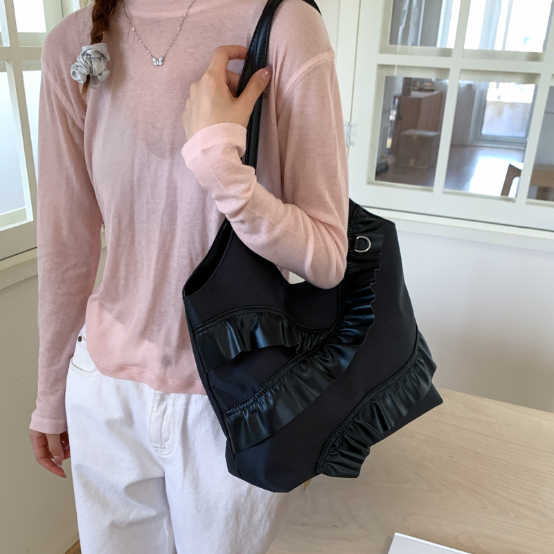 Versión coreana del bolso de nicho 2025 verano nuevo bolso femenino lindo bolso de encaje casual bolso de hombro de gran capacidad