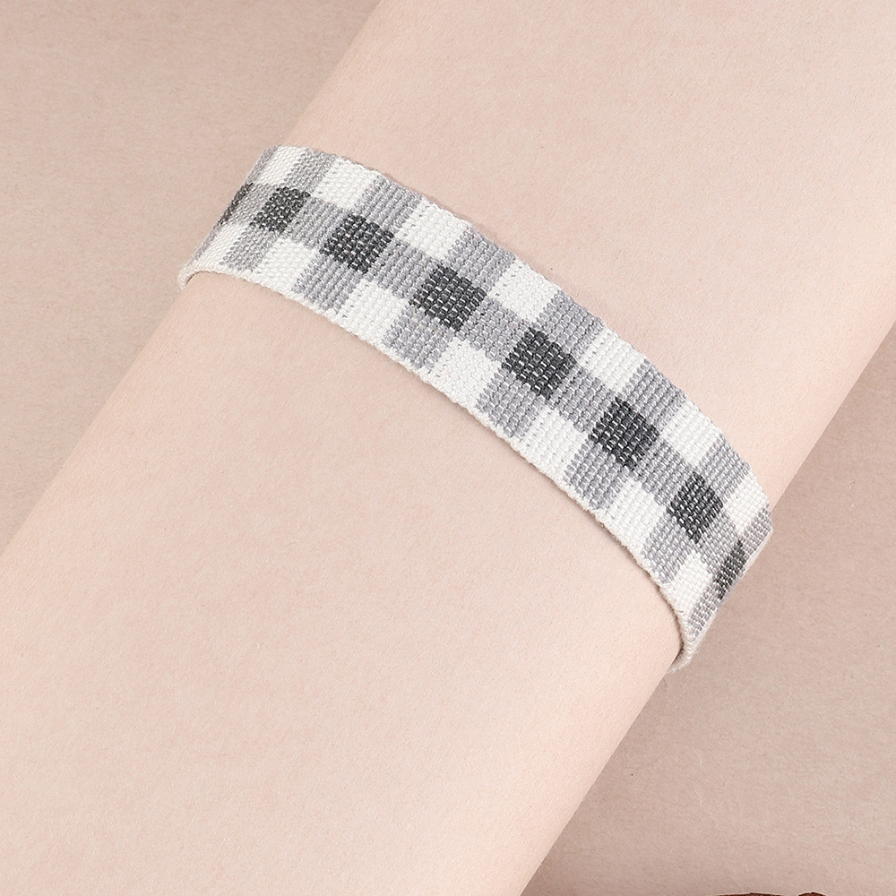 Simple Fashion Black White Plaid Tassel Braided Bracelet display picture 2