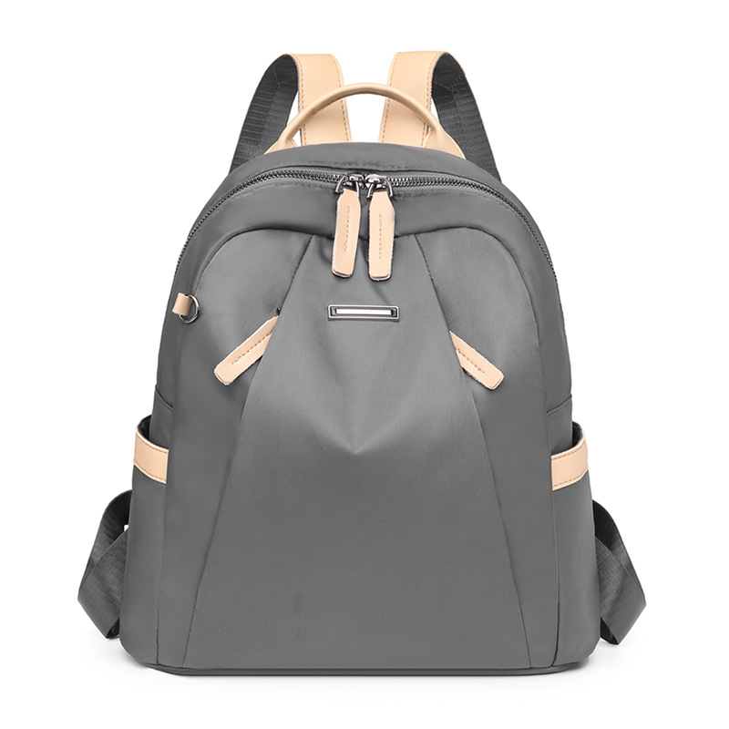 2024 verano nuevo estilo coreano damas mochila de nailon moda color contraste ligero mochila de viaje al aire libre al por mayor