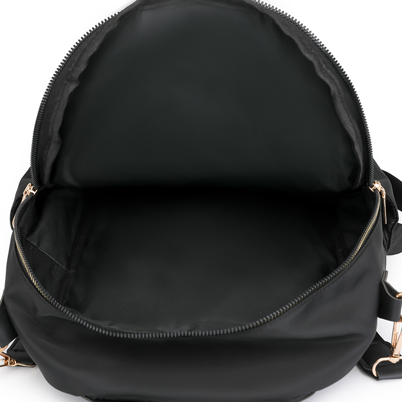 Mochila para mujer 2024 nueva mochila de viaje de ocio de nailon de la moda coreana de todo fósforo