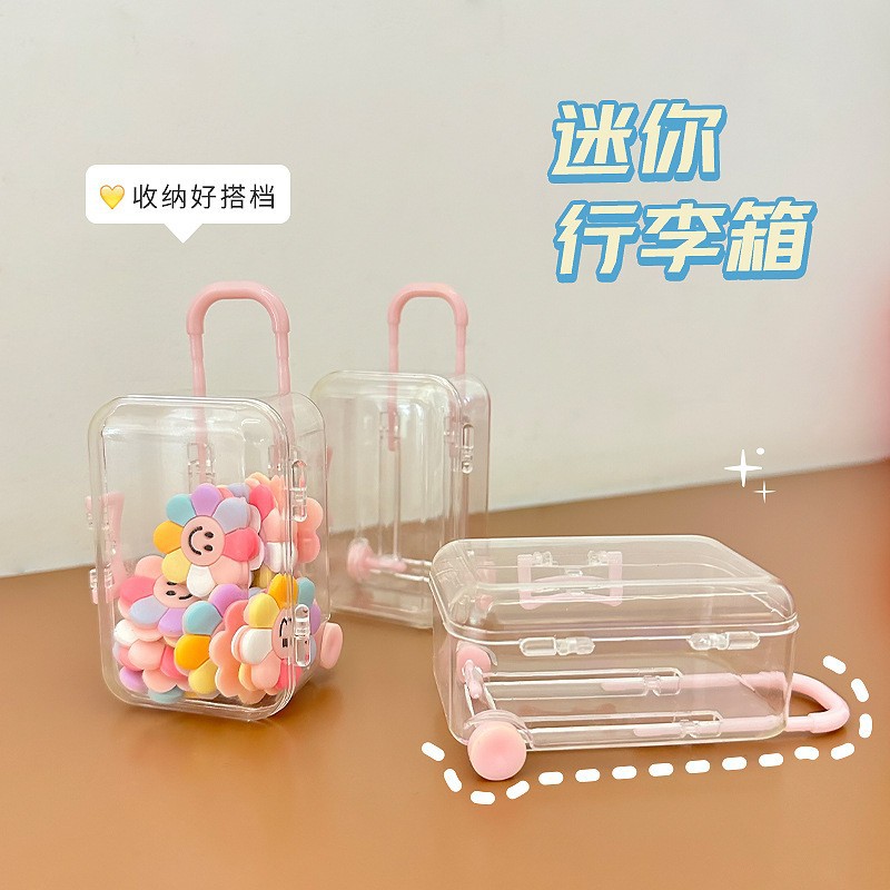 Venta directa de fábrica caja con ruedas retráctiles ultrapequeñas, mini caja de almacenamiento de joyería transparente móvil, caja linda al por mayor