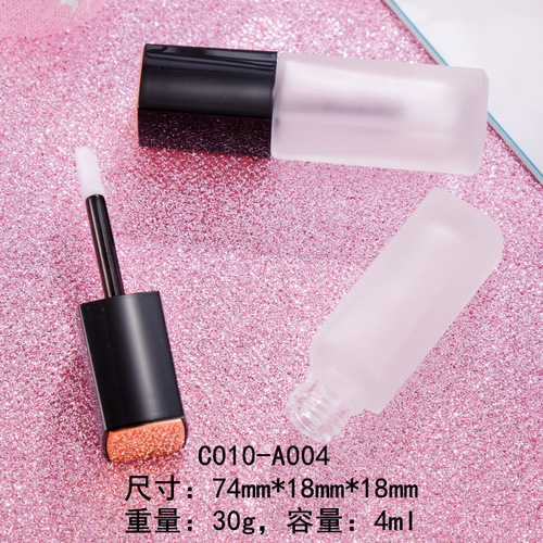 Wholesale empty lip glaze tube, empty glass tube with spray gold top and black cover, lip gloss bottle lip glaze tube