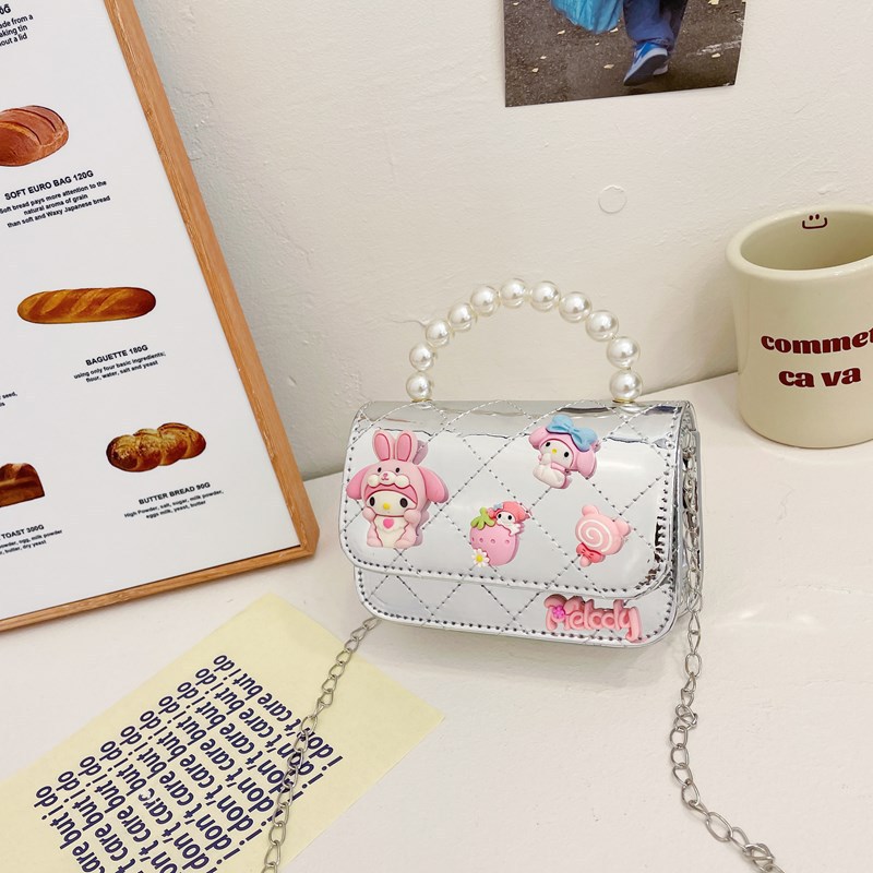 Bolso infantil 2024 nuevo estilo coreano de cadena de dibujos animados bolso de hombro estilo Xiaoxiang Ling mochila para hombres y mujeres bolsos pequeños