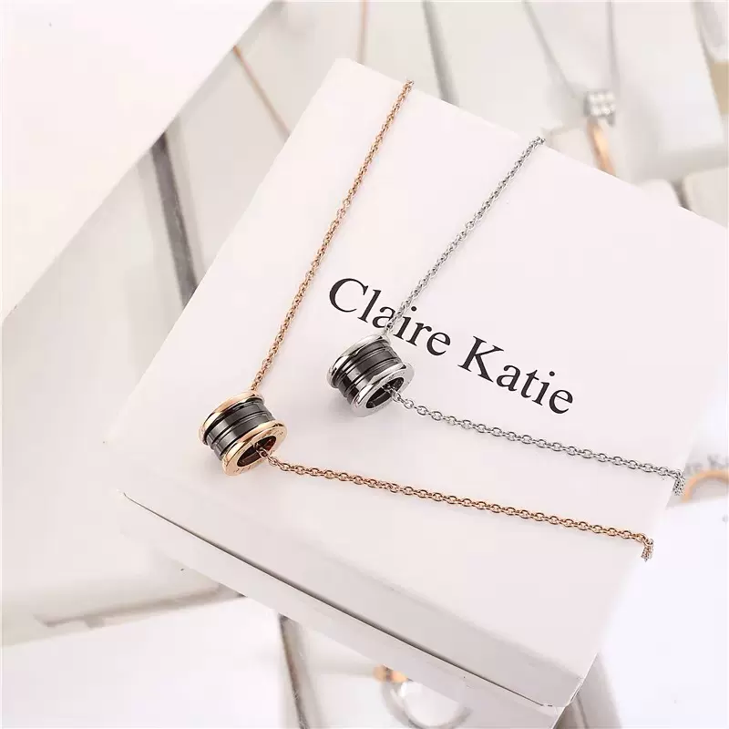 欧美时尚经典小蛮腰项链流苏黑陶瓷弹簧吊坠简约时尚气质