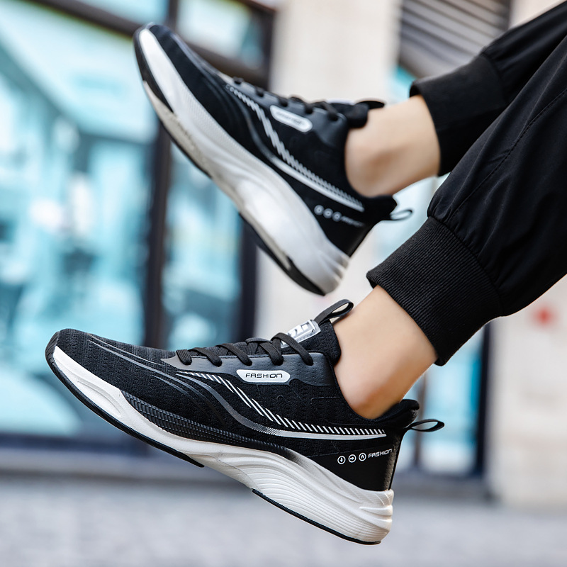 Zapatos de hombre primavera y verano nuevo estilo transpirable y no apestoso marca de moda zapatos deportivos de alta gama hombres y mujeres con el mismo estilo zapatos para correr de malla transpirables