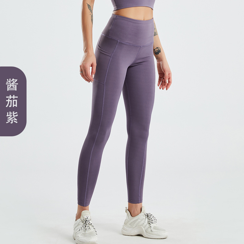 Amazon tamaño europeo pantalones de yoga transfronterizos bolsillo lateral de las mujeres melocotón cintura alta Levantamiento de cadera medias de fitness europeas y americanas