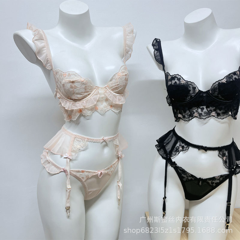 Girly French-style embroidered lace lingerie set for women with ruffled shoulder straps, push-up bra, garter belt, and panties