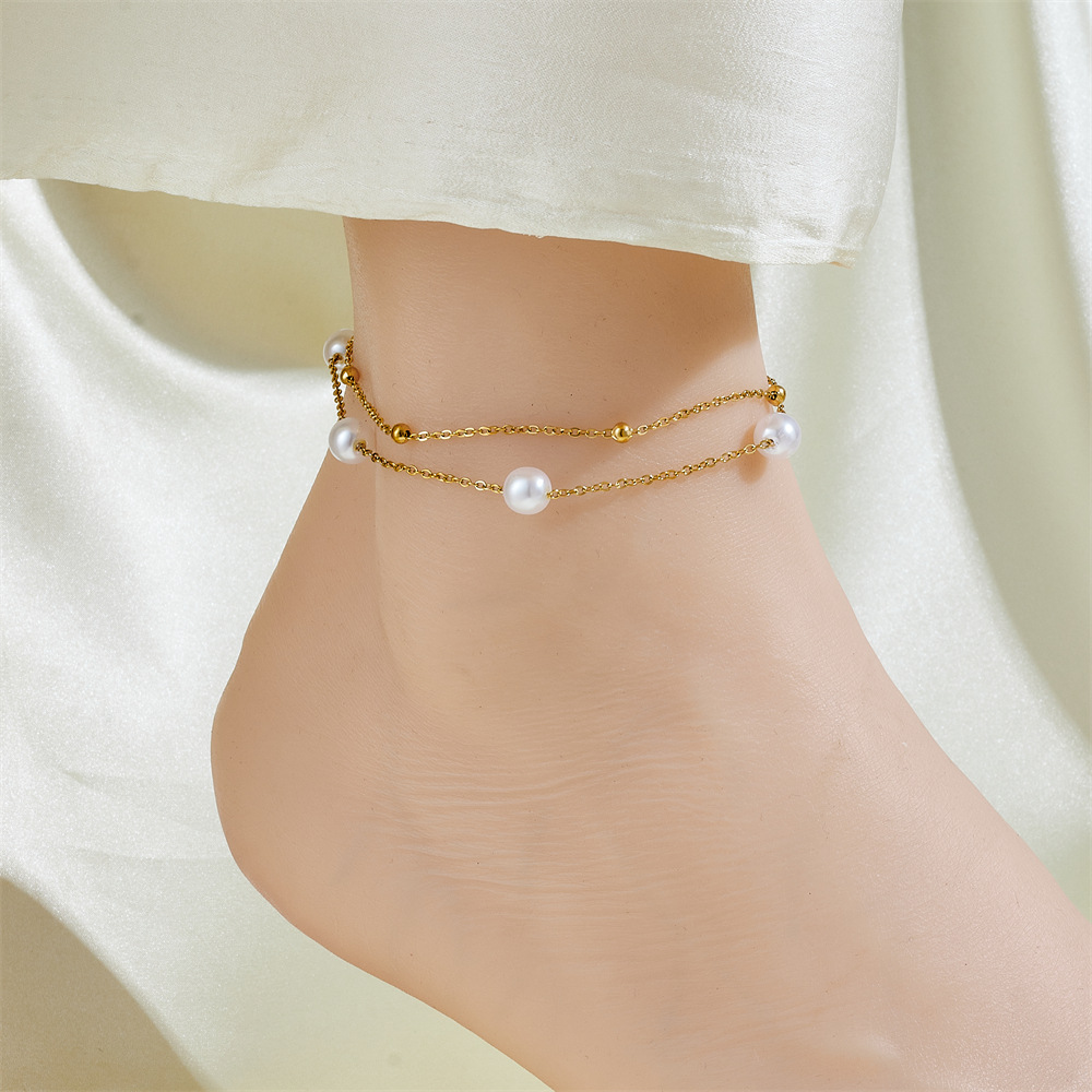 Cientos de tobilleras, tobilleras de lujo simples y ligeras, sentido femenino, accesorios de celebridades de Internet, temperamento de moda dorado de 18 quilates, cadena de pie de acero de titanio sexy