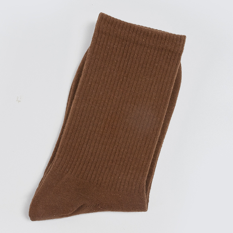 Calcetines de mujer para primavera y otoño, calcetines de algodón de color liso, versátiles y a la moda, calcetines holgados, calcetines de longitud media, calcetines deportivos que absorben el sudor, venta al por mayor.