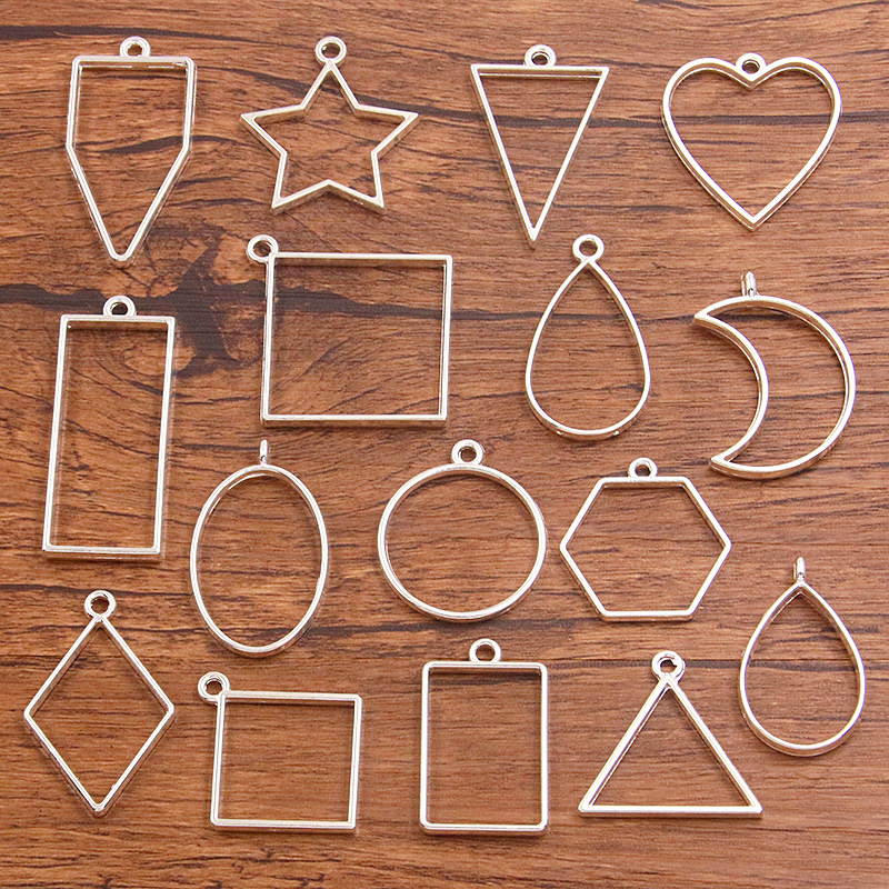 16 Styles of Bright Silver DIY Alloy Jewelry Accessories, Moon-Shaped Heart Pendants, Charming Resin Hollow Frames 16 Styles of Bright Silver DIY Alloy Jewelry Accessories, Moon-Shaped Heart Pendants, Charming Resin Hollow Frames