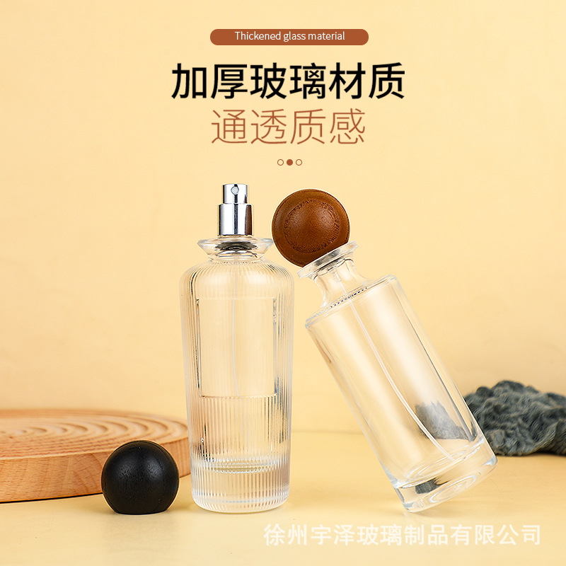 现货卡口晶白料玻璃香水瓶化妆品按压喷雾瓶厚底圆柱长款竖纹球形