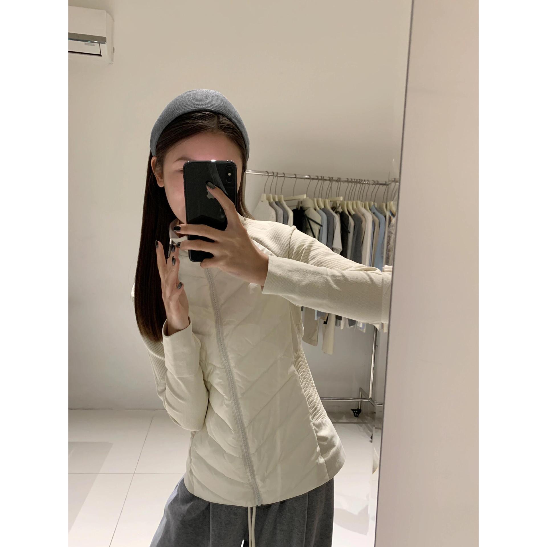 White winter light and thin down jacket