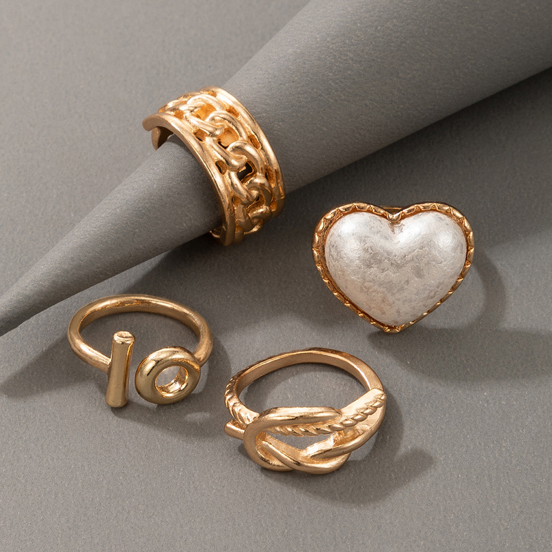 European And American Pearl Heart Ring Four-piece Irregular Geometric Hollow Ring Set display picture 5