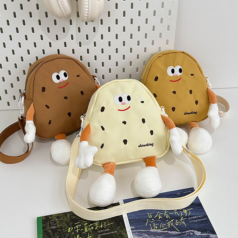 Bolsos de hombro de dibujos animados japoneses para niños y niñas lindos y interesantes pequeñas galletas bebés mochila 2025 nuevo tipo de bolsos para niños