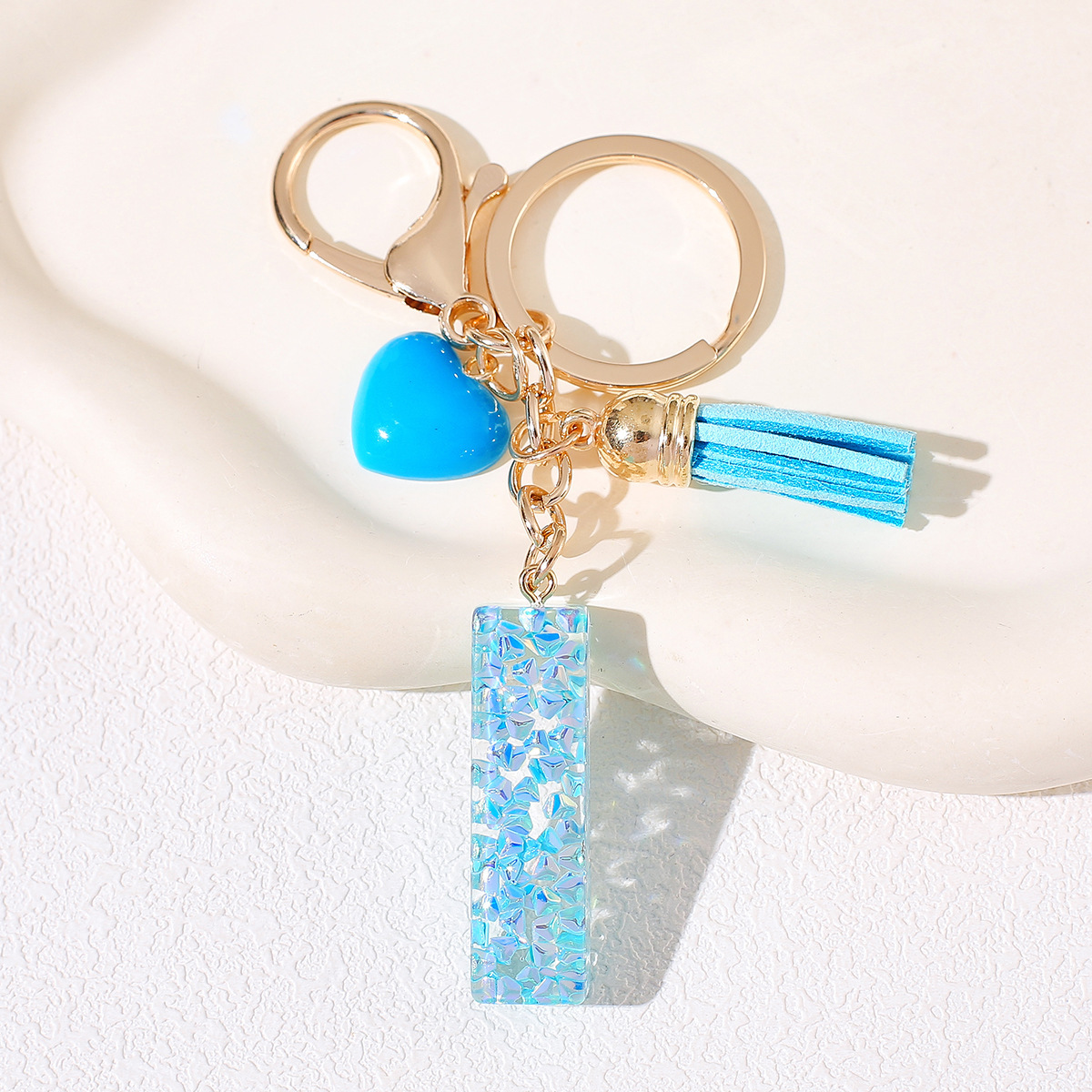 Nuevos productos azules de amor con frascos de letras lindos enclavadores decoraciones europeas y americanas populares llaveros damas