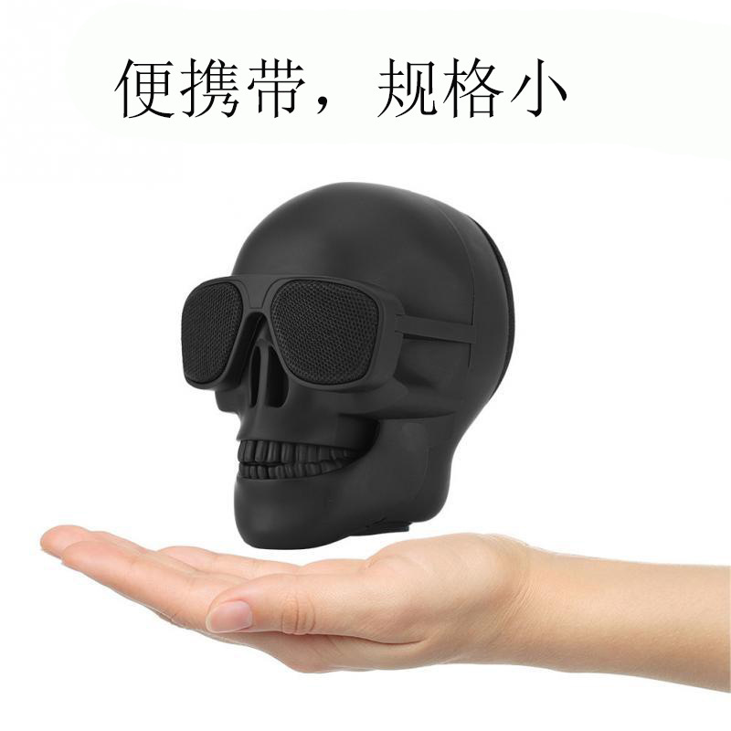 Popular mini cráneo Altavoz Bluetooth inalámbrico al aire libre conveniente dibujos animados hueso fantasma cabeza regalo subwoofer