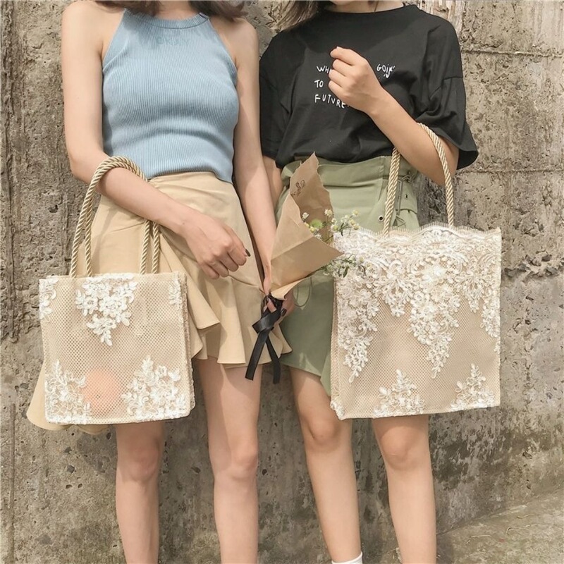 Korean niche design lace handbag for women, 2021 new fairy-style tote bag, summer beach bag, shopping bag