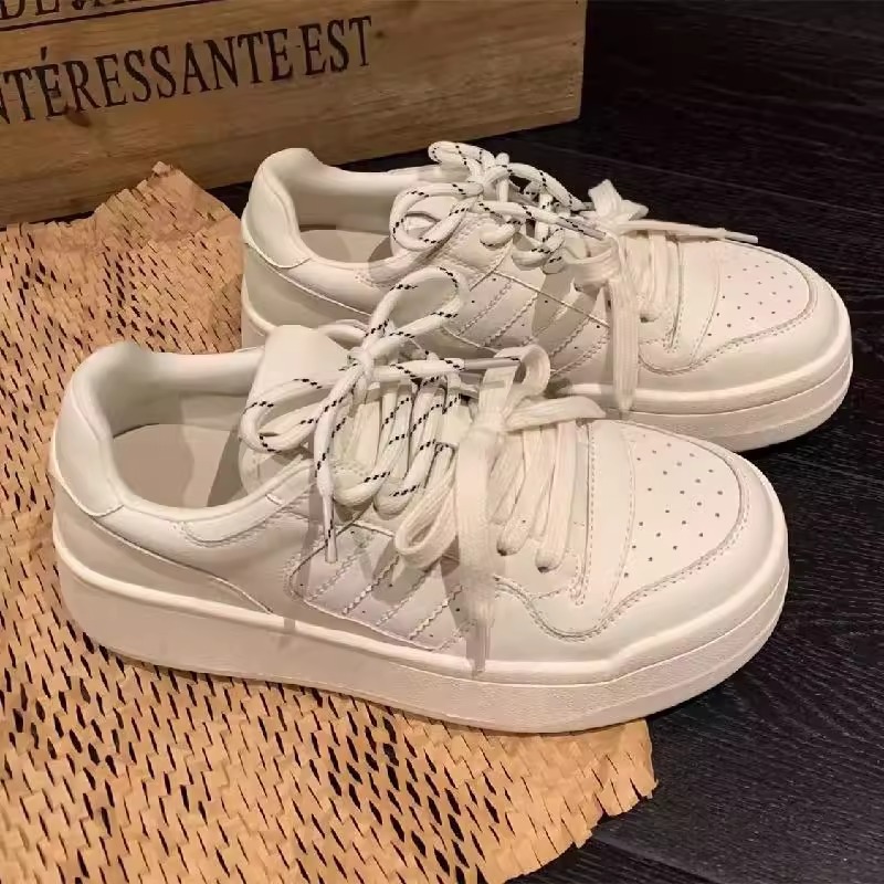 Zapatos blancos de suela gruesa de cuero para mujer 2025 nuevos zapatos de entrenamiento alemanes de punta redonda con cordones zapatos deportivos casuales zapatos transpirables de todo fósforo