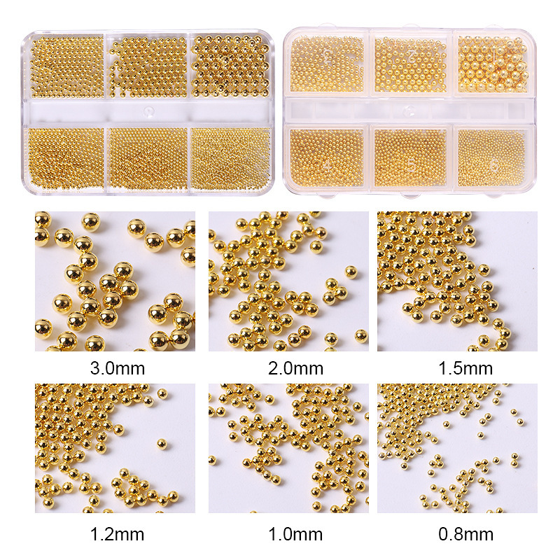 Accesorios de uñas transfronterizos al por mayor 6-grid nail aleación de acero cuentas oro plata tamaño mezclado decoraciones de uñas al por mayor