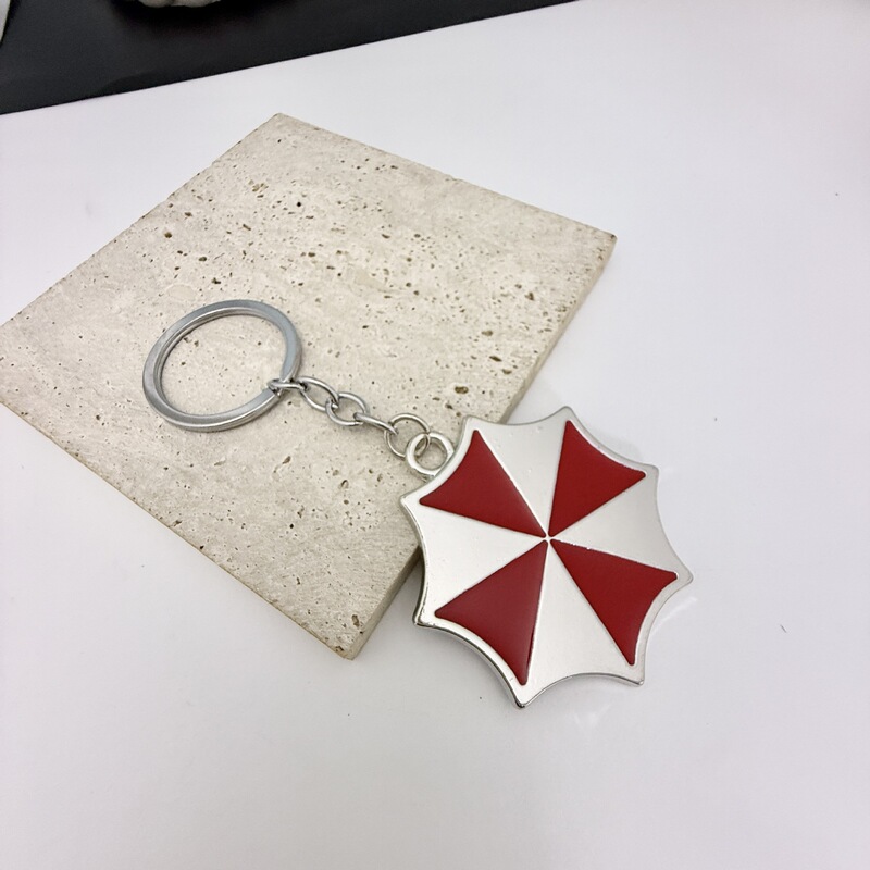 European and American Movie Merchandise Resident Evil Umbrella Logo Keychain Pendant Wholesale European and American Movie Merchandise Resident Evil Umbrella Logo Keychain Pendant Wholesale