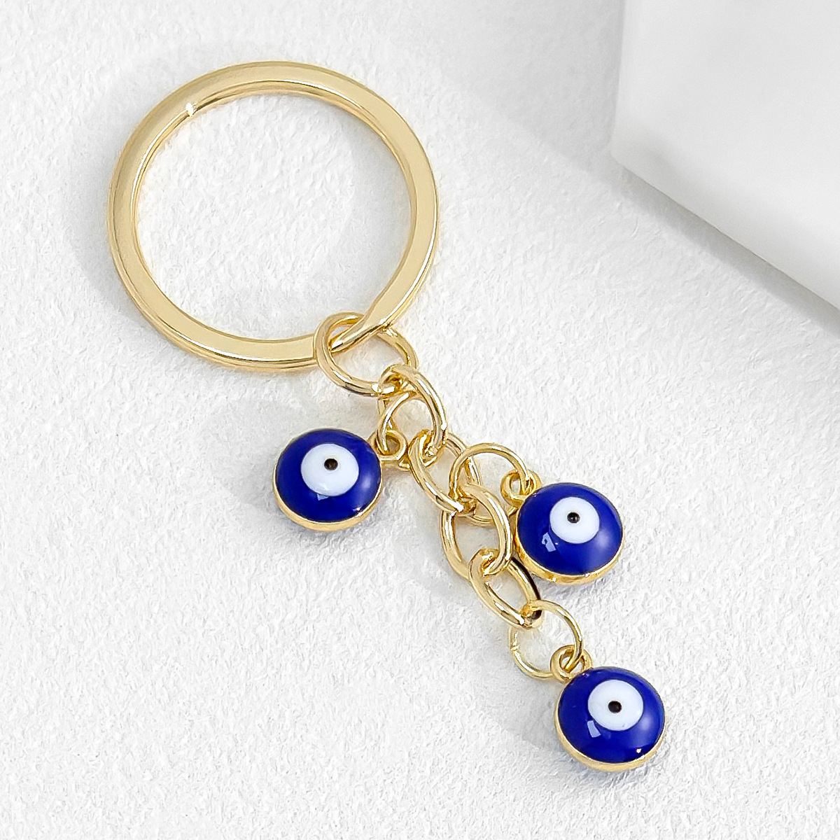 Cross-Border Hot Sale New Heart-Shaped Palm Water Drop Evil Eye Pendant Accessories Keychain Key Ring Manufacturer_voghion.com