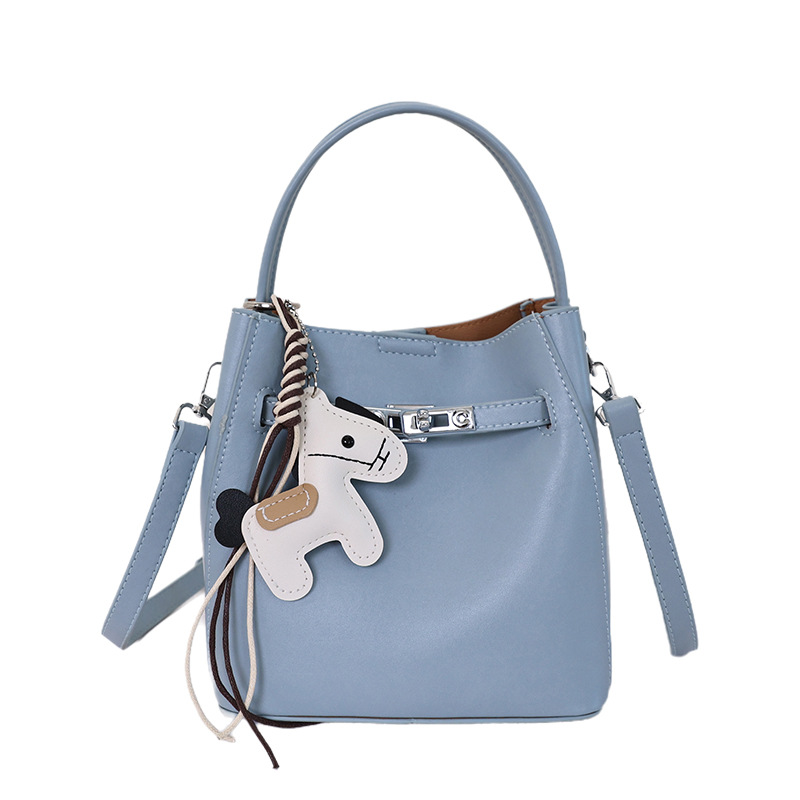 Bolsa de cubo de moda coreana para mujeres 2026 venta caliente nuevo lujo ligero versátil textura alta mochila de hombro