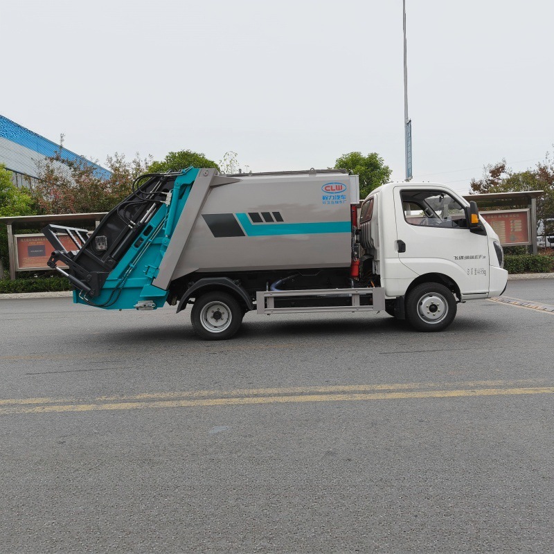 Pure electric sanitation vehicle with a sealed garbage compactor, designed for automatic compression of municipal solid waste for collection and transportation