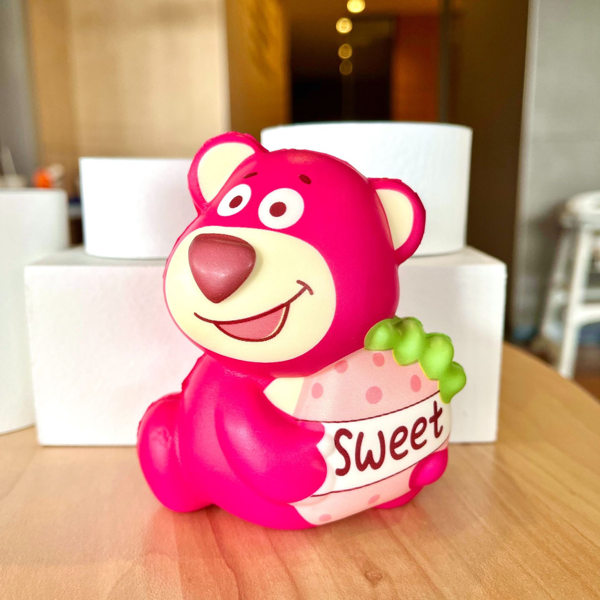 Strawberry bear party pinch [sitting holding strawberry]