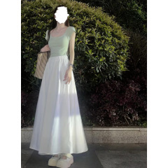 白い半身のスカートの長いタイプの女性2025の新型の小さい背の白いスカートの半分のスカートの垂れ下がっている感じのa字の大きいスカートの夏