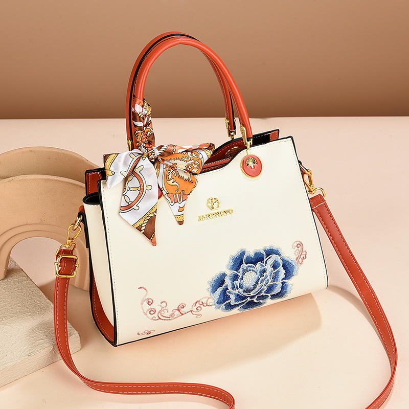 Bolsa de mano de mujer elegante regalo 2025 nuevo estilo para la suegra flores bordadas de moda bolso de hombro