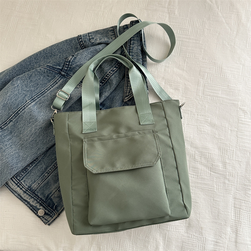 Corea del estilo de transporte universal lona multi-bolsillo TOT estudiantes de arte ocio simple 2025 bolso de hombro portátil