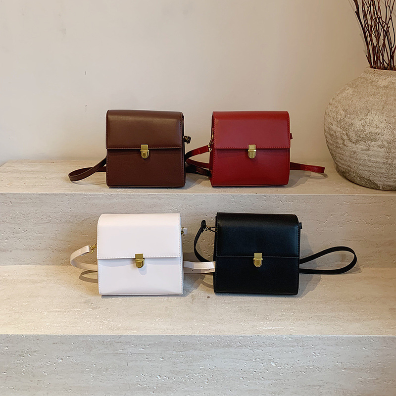 Bolsa de moda coreana para mujeres 2025 primavera nueva moda textura de bloqueo mochila de viaje simple mochila de hombro