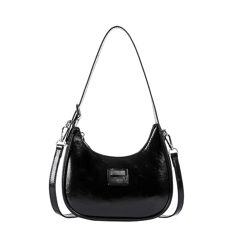 Bolsos de mujer al por mayor, nueva tendencia, bolsos de hombro de moda de alta gama, color sólido, dulce y fresco, bolso de bola de masa de mensajero con estampado brillante